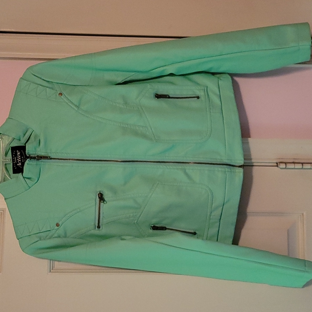 Spiritual Quality Active USA jacket.  Never worn, size Large,